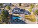 Aerial view of the property showcasing the backyard pool, patio, and outdoor space at 1185 W 140Th Dr, Westminster, CO 80023