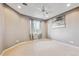 Bright bedroom features neutral tones, a ceiling fan, natural light and ample space at 1185 W 140Th Dr, Westminster, CO 80023