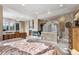 Spacious main bedroom featuring a fireplace, neutral tones, and natural light at 1185 W 140Th Dr, Westminster, CO 80023