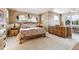 Main bedroom featuring neutral tones, dresser, nightstands, and calm aesthetic at 1185 W 140Th Dr, Westminster, CO 80023