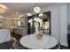 Cozy dining area adjacent to kitchen, featuring views of the backyard at 6111 Huron Pl, Castle Rock, CO 80108