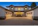 Stunning home featuring a stone facade, a large driveway, and a 3-car garage at 6111 Huron Pl, Castle Rock, CO 80108