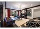 Recreation space features a pool table, fireplace, and comfortable seating at 6111 Huron Pl, Castle Rock, CO 80108