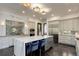 Modern kitchen features a center island, stainless appliances, and ample counter space at 6111 Huron Pl, Castle Rock, CO 80108