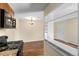 Kitchen boasting granite countertops and modern appliances at 5995 E Iliff Ave # 317, Denver, CO 80222