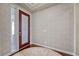 Beautiful entryway with a decorative front door, stylish wallpaper, and hardwood floors offers a welcoming entrance at 16043 Azalea Ave, Parker, CO 80134