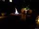 Outdoor fire pit provides a cozy and inviting ambiance during the evening at 16043 Azalea Ave, Parker, CO 80134