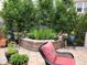 Landscaped yard with stone borders, planters, flowers, trees and lawn at 16043 Azalea Ave, Parker, CO 80134