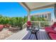 Back patio features outdoor seating and stone fire pit for entertainment at 16043 Azalea Ave, Parker, CO 80134