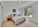 Cozy bedroom with a window, closet, and neutral decor at 20591 E Weaver Ave, Aurora, CO 80016
