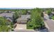 Charming ranch home with well-manicured lawn, two-car garage, and mature trees in a suburban neighborhood at 20591 E Weaver Ave, Aurora, CO 80016