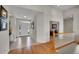 Bright foyer with tile and hardwood floors, leading to an open floor plan with natural light at 20591 E Weaver Ave, Aurora, CO 80016
