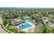 Aerial view of the community pool, clubhouse, and tennis courts; recreational amenities for residents at 20591 E Weaver Ave, Aurora, CO 80016
