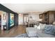 Open-concept living space with a kitchen and a comfortable sectional couch at 3100 E Cherry Creek South Dr # 1403, Denver, CO 80209