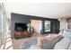 Spacious living room with hardwood floors and a media center at 3100 E Cherry Creek South Dr # 1403, Denver, CO 80209