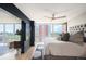 Bright main bedroom with large windows and a cityscape view at 3100 E Cherry Creek South Dr # 1403, Denver, CO 80209