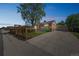 Charming brick home featuring a spacious driveway and well-maintained landscaping at 7820 Tejon St, Denver, CO 80221