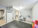 Home gym featuring ample workout space, fitness equipment, and rubber flooring for exercise and wellness activities at 7820 Tejon St, Denver, CO 80221