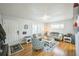 Cozy living room with hardwood floors, neutral decor, and plenty of natural light at 7820 Tejon St, Denver, CO 80221