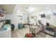 Bright home office with multiple workstations, shelving, and natural light, ideal for remote work and creative projects at 7820 Tejon St, Denver, CO 80221