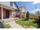Quaint home with a welcoming porch and well-maintained lawn, creating curb appeal at 308 Inca St, Denver, CO 80223