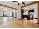 Open-concept space with hardwood floors connecting the living area and kitchen at 308 Inca St, Denver, CO 80223