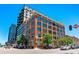 Exterior daytime shot of brick building with many windows at 2000 Arapahoe St # 503, Denver, CO 80205