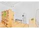 Entryway with hardwood floors, wooden shelving unit, a bench, and modern decor accents at 2000 Arapahoe St # 503, Denver, CO 80205