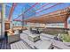 Rooftop deck with comfortable seating, dining area, and city views, perfect for entertaining and enjoying the cityscape at 2000 Arapahoe St # 503, Denver, CO 80205
