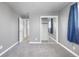 Well lit bedroom with gray walls, new carpet and mirrored closet at 537 S 2Nd Ave, Brighton, CO 80601