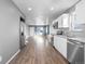 Modern kitchen with white cabinets and stainless steel appliances at 537 S 2Nd Ave, Brighton, CO 80601