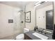 Modern bathroom featuring a walk-in shower with sleek fixtures, a floating vanity, and a stylish mirror at 600 Cascade Dr, Golden, CO 80403