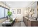 Stylish bathroom features a soaking tub, walk-in shower, double vanity, and modern fixtures at 600 Cascade Dr, Golden, CO 80403