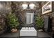 Chic powder room featuring modern fixtures, unique wallpaper, and a round mirror at 600 Cascade Dr, Golden, CO 80403