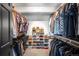 Organized walk-in closet with ample storage for clothes, shoes, and accessories at 600 Cascade Dr, Golden, CO 80403