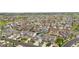 Expansive aerial view showcases a community of well-maintained homes and green spaces at 8814 S Winnipeg Ct, Aurora, CO 80016