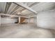 Unfinished basement offers plenty of potential with an open layout and exposed beams at 8814 S Winnipeg Ct, Aurora, CO 80016
