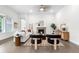 Cozy living room boasts stylish decor, plush seating, and a charming fireplace at 8814 S Winnipeg Ct, Aurora, CO 80016