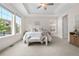 Bright and airy main bedroom with large windows and tray ceiling at 8814 S Winnipeg Ct, Aurora, CO 80016