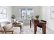 Charming office with a desk, comfortable chairs, and ample natural light at 8814 S Winnipeg Ct, Aurora, CO 80016