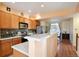 Modern kitchen with island and stainless steel appliances at 18726 E Yale Cir # F, Aurora, CO 80013