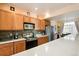 Bright kitchen featuring stainless steel appliances and ample counter space at 18726 E Yale Cir # F, Aurora, CO 80013