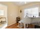 Bright music room featuring a grand piano and built-in shelving at 18726 E Yale Cir # F, Aurora, CO 80013