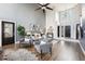Spacious living room with soaring ceilings, modern furnishings, and a grand entrance at 13071 Emerson St, Thornton, CO 80241