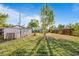 Expansive backyard with a shed and ample green space, offering plenty of room for outdoor activities at 7550 Stuart St, Westminster, CO 80030