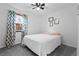 Bright bedroom with natural light, ceiling fan, and modern decor at 7550 Stuart St, Westminster, CO 80030
