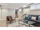Finished basement showcasing a comfortable seating area and staircase access at 3527 W 44Th Ave, Denver, CO 80211