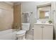 Well-maintained bathroom with a tub and shower, vanity, and a neutral color palette at 3527 W 44Th Ave, Denver, CO 80211