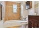 Updated bathroom with tiled shower, dark wood vanity, and modern fixtures at 3527 W 44Th Ave, Denver, CO 80211