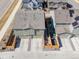 Aerial view of the home showcasing fenced backyards and two-car garages at 28334 E 6Th Pl, Watkins, CO 80137